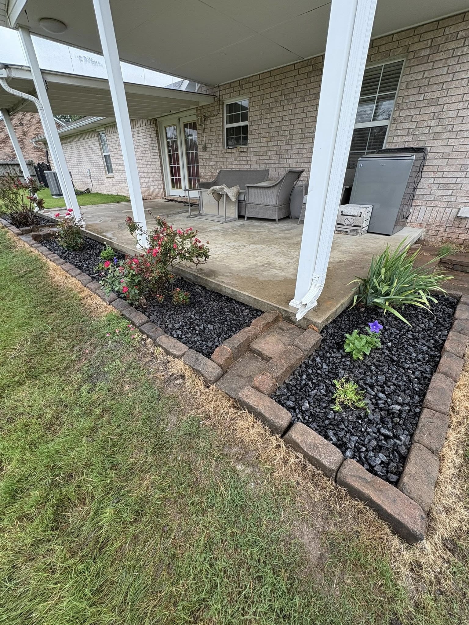 flower bed around back patio
